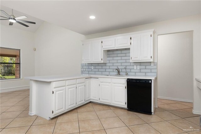 kitchen with black dishwasher, light tile patterned floors, light countertops, backsplash, and a peninsula