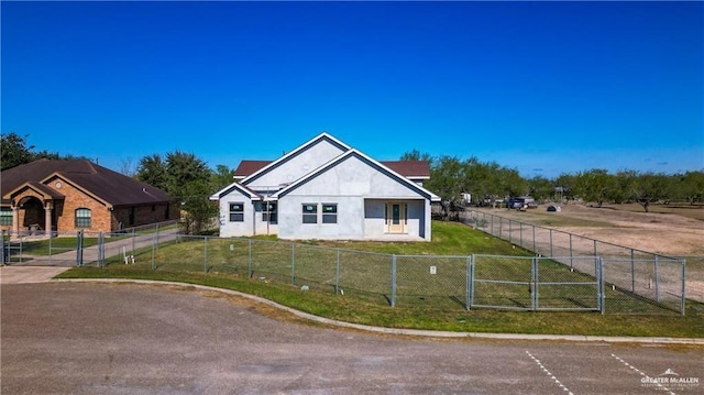 view of front of home with a front lawn