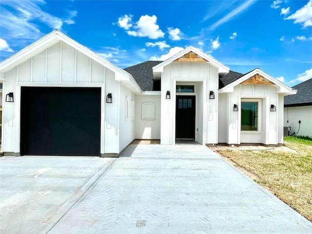 modern farmhouse with a garage