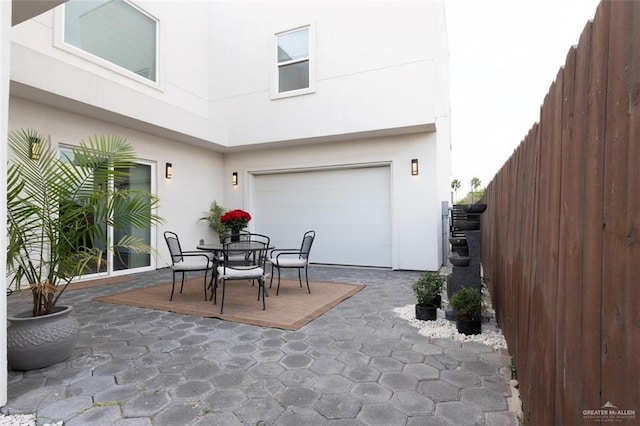 view of patio / terrace with fence and outdoor dining space