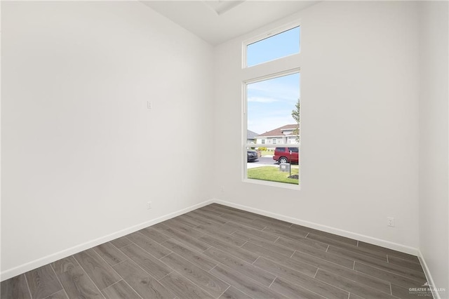 904 N Trinity St, Edinburg, TX 78541 - spare room with dark wood-style flooring