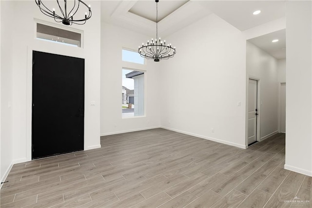 904 N Trinity St, Edinburg, TX 78541 - unfurnished dining area featuring a chandelier, light wood-style flooring, and recessed lighting