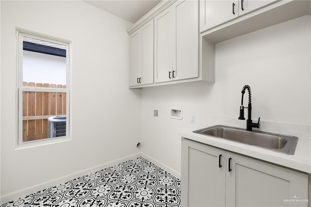 904 N Trinity St, Edinburg, TX 78541 - washroom with cabinet space, hookup for a washing machine, and electric dryer hookup