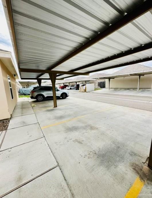 garage featuring a carport