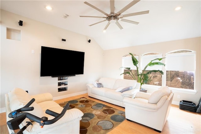 living area featuring visible vents, wood finished floors, recessed lighting, ceiling fan, and vaulted ceiling