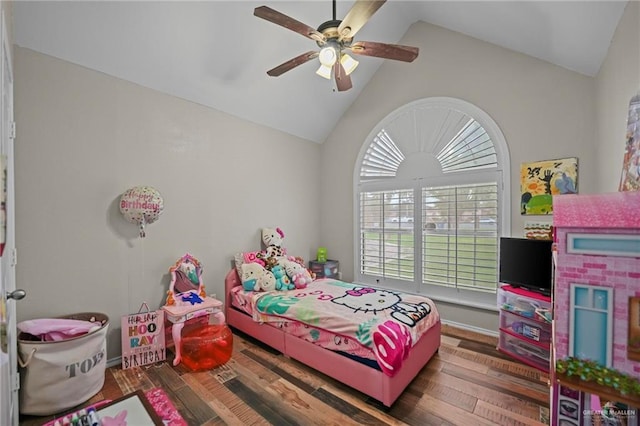 bedroom featuring ceiling fan, wood-type flooring, and lofted ceiling