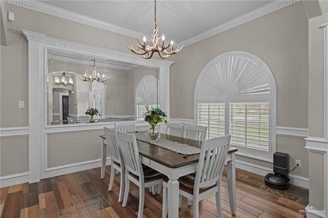 dining space featuring dark hardwood / wood-style flooring and ornamental molding