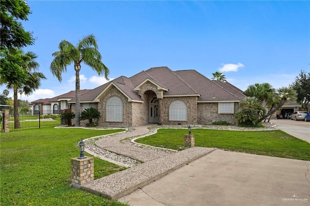 ranch-style house with a front lawn