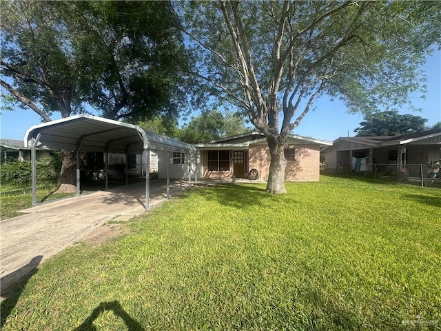 1008 S 3rd St, Edinburg, TX 78539 - view of front of property featuring a detached carport and driveway
