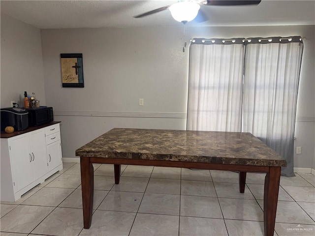 1008 S 3rd St, Edinburg, TX 78539 - dining space featuring ceiling fan and light tile patterned floors