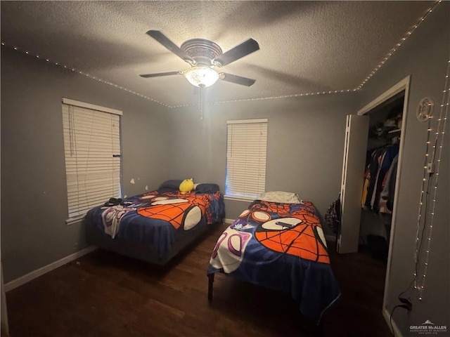 1008 S 3rd St, Edinburg, TX 78539 - bedroom featuring wood finished floors, a textured ceiling, ceiling fan, and a closet