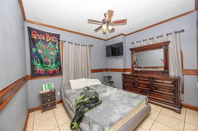 tiled bedroom featuring ceiling fan and crown molding