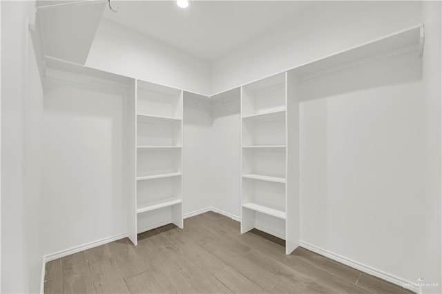 2208 Providence Ave, Mcallen, TX 78504 - walk in closet with wood finished floors