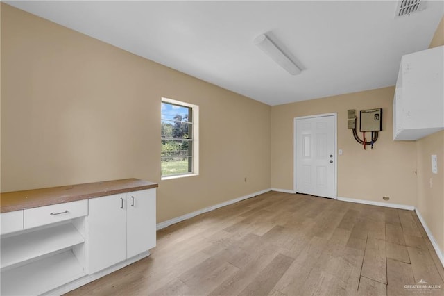 209 E 11th St, San Juan, TX 78589 - unfurnished room featuring light wood finished floors and baseboards