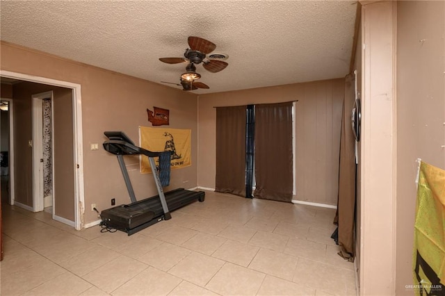 408 E Ebony St, La Feria, TX 78559 - exercise area with a ceiling fan, a textured ceiling, and light tile patterned floors