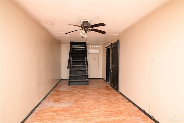 408 E Ebony St, La Feria, TX 78559 - hall with stairs and light wood finished floors