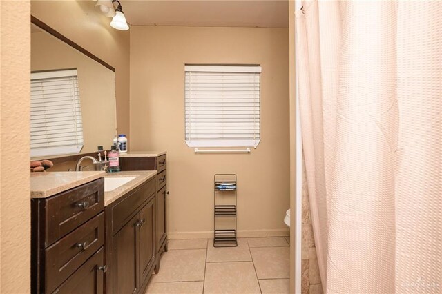 408 E Ebony St, La Feria, TX 78559 - bathroom featuring vanity and tile patterned floors