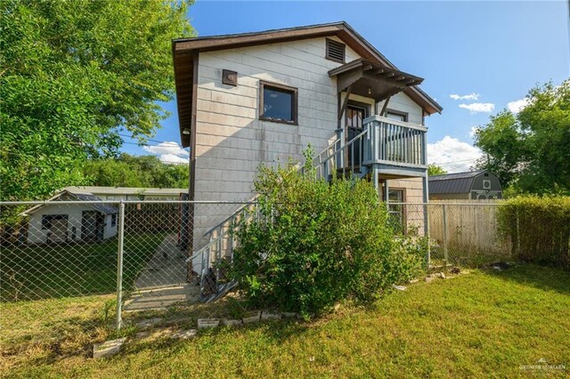 408 E Ebony St, La Feria, TX 78559 - view of front of home featuring stairway