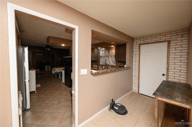 408 E Ebony St, La Feria, TX 78559 - foyer entrance with a ceiling fan and light tile patterned floors