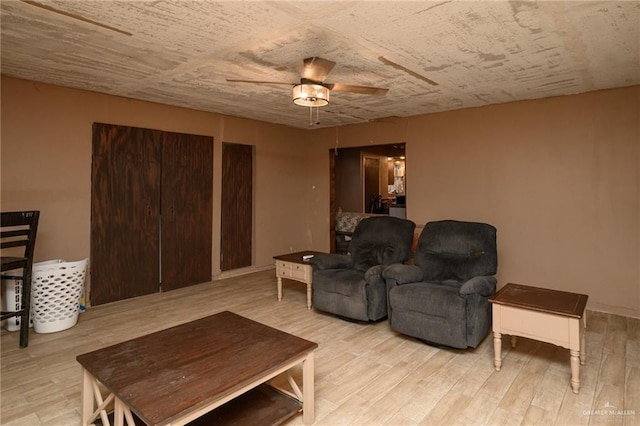 408 E Ebony St, La Feria, TX 78559 - living room featuring ceiling fan and light wood-style floors