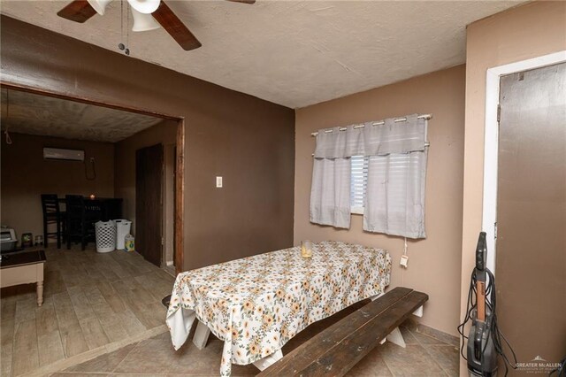 408 E Ebony St, La Feria, TX 78559 - bedroom with a ceiling fan and a wall mounted AC