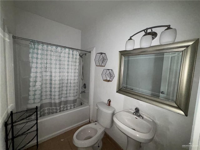1708 Ivory St, Edinburg, TX 78541 - bathroom with shower / tub combo with curtain and toilet