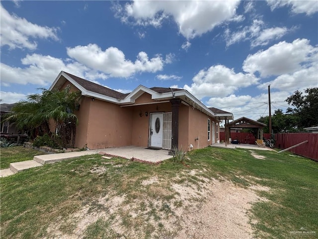 1708 Ivory St, Edinburg, TX 78541 - view of front facade with a gazebo, stucco siding, and a patio area