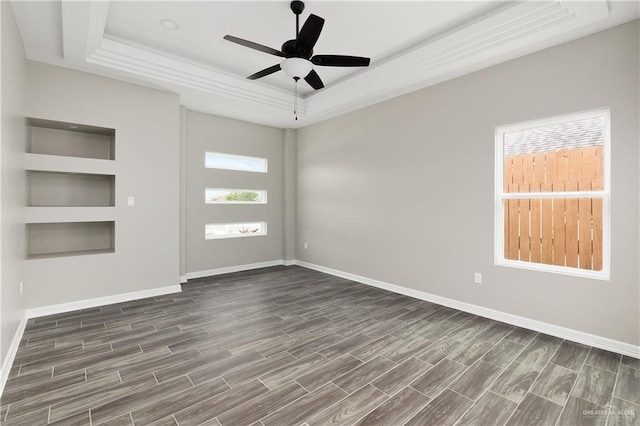 4911 Aguajito St, Edinburg, TX 78542 - interior space with a raised ceiling, ceiling fan, and dark wood-type flooring