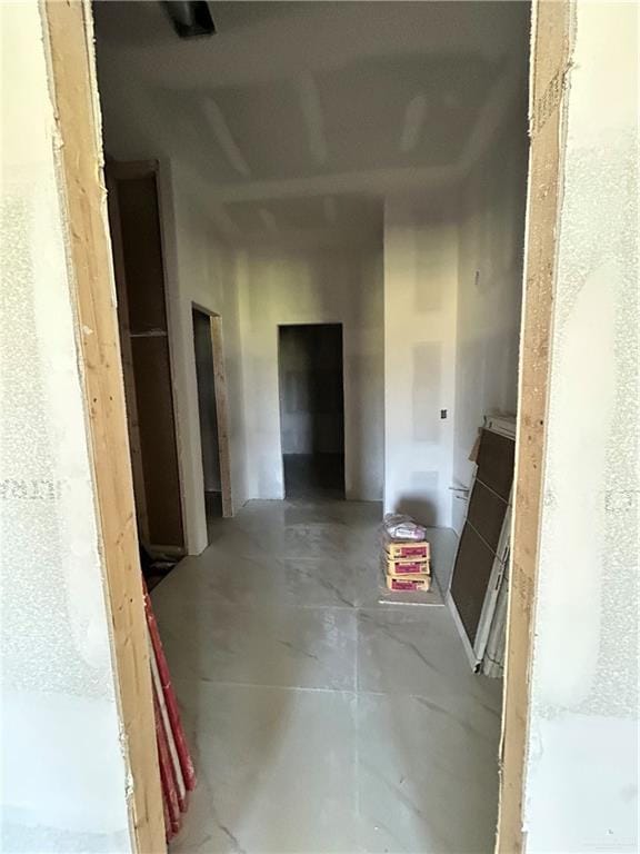 132 Finch Ln, Los Fresnos, TX 78566 - corridor with concrete flooring