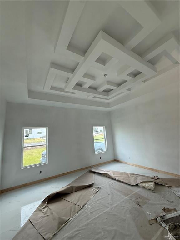 132 Finch Ln, Los Fresnos, TX 78566 - unfurnished room with coffered ceiling, baseboards, and beamed ceiling