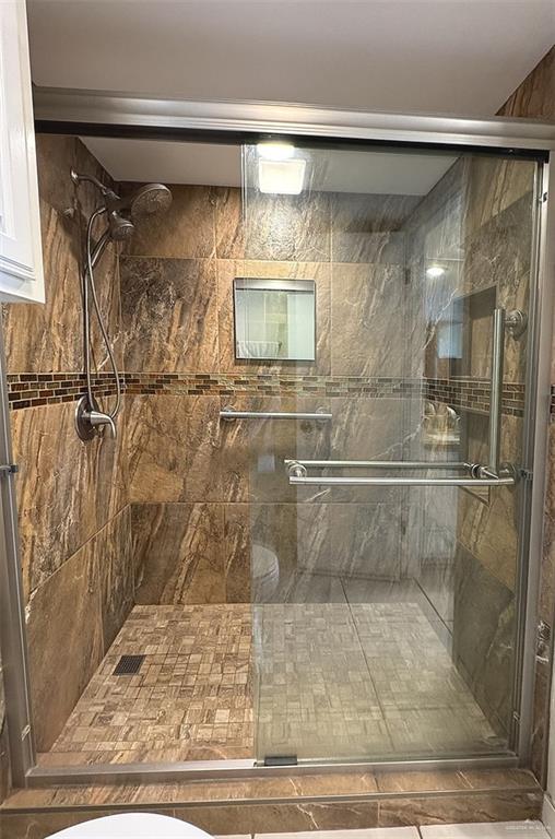 3400 Gulf Blvd Unit 403, South Padre Island, TX 78597 - full bath featuring a shower stall