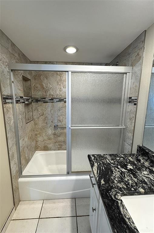 3400 Gulf Blvd Unit 403, South Padre Island, TX 78597 - bathroom featuring vanity, tile patterned floors, bath / shower combo with glass door, and recessed lighting