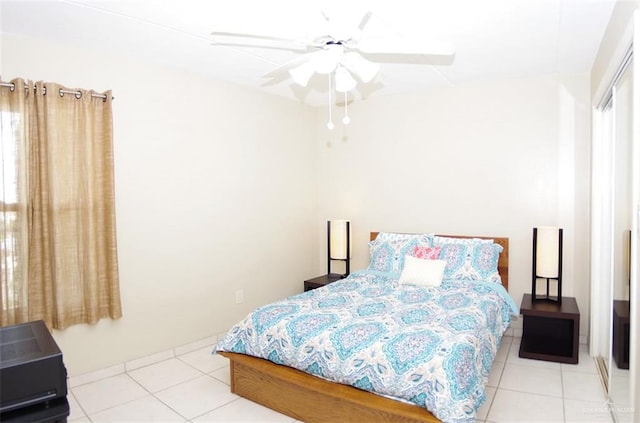 3400 Gulf Blvd Unit 403, South Padre Island, TX 78597 - tiled bedroom with ceiling fan