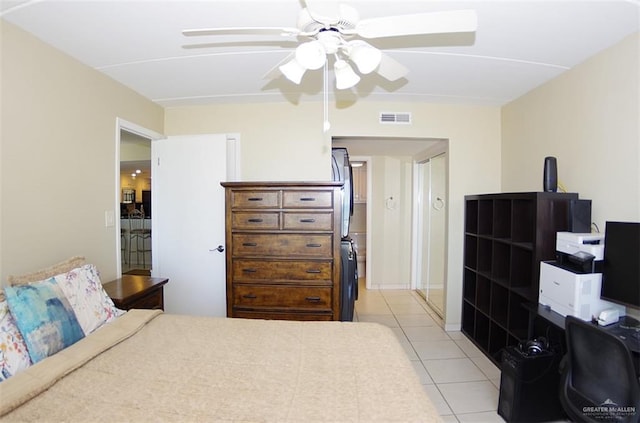 3400 Gulf Blvd Unit 403, South Padre Island, TX 78597 - bedroom featuring light tile patterned flooring, a desk, and ceiling fan