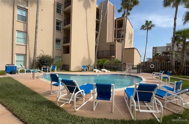 3400 Gulf Blvd Unit 403, South Padre Island, TX 78597 - community pool with a patio area