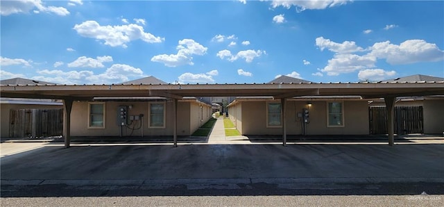 exterior space featuring a carport