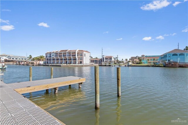 view of dock with a water view