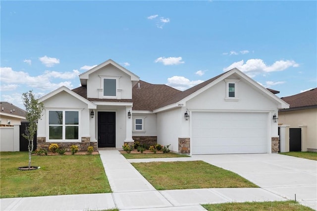 view of front of property with stucco siding, a shingled roof, stone siding, driveway, and a front lawn