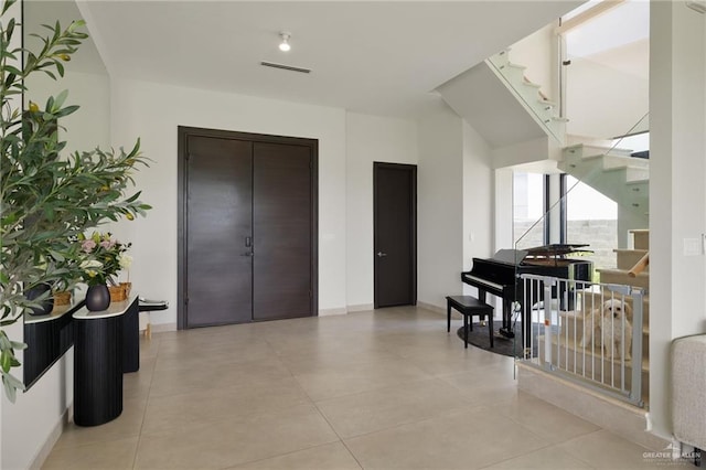 2701 W Duke Dr, Edinburg, TX 78539 - entryway featuring stairway and baseboards