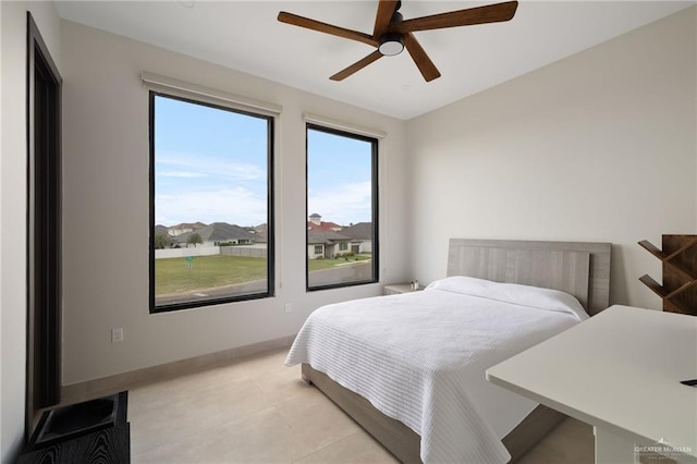 2701 W Duke Dr, Edinburg, TX 78539 - bedroom featuring baseboards and ceiling fan