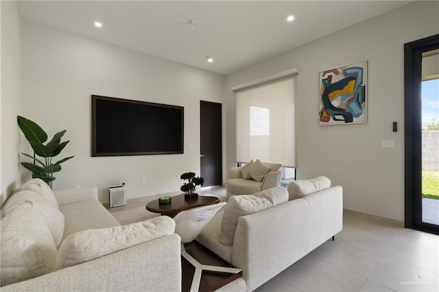 2701 W Duke Dr, Edinburg, TX 78539 - living room with recessed lighting, light tile patterned floors, and baseboards