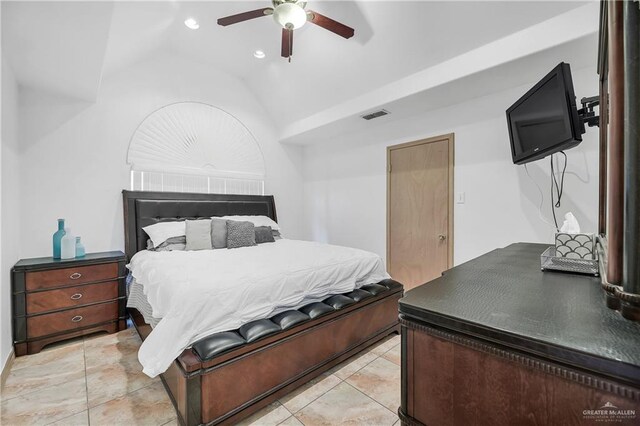 bedroom featuring ceiling fan and lofted ceiling