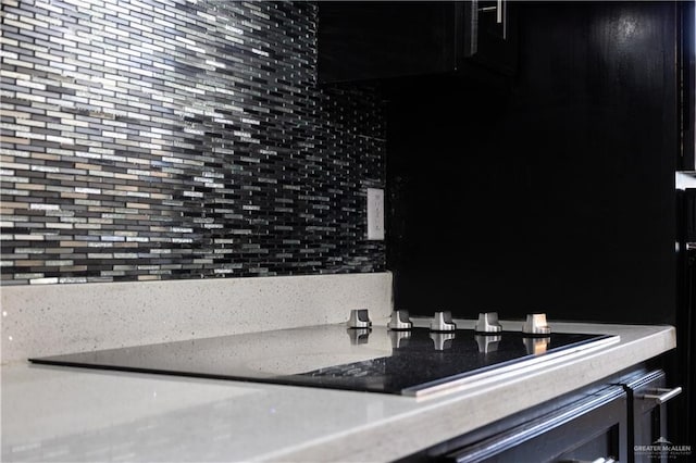 room details featuring black electric cooktop