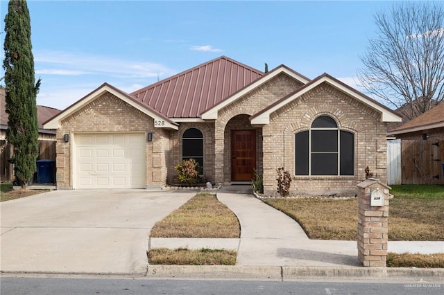 ranch-style house featuring a garage