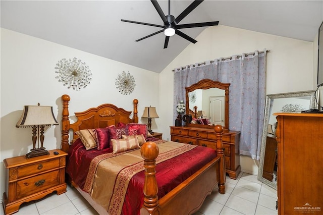 tiled bedroom with vaulted ceiling and ceiling fan