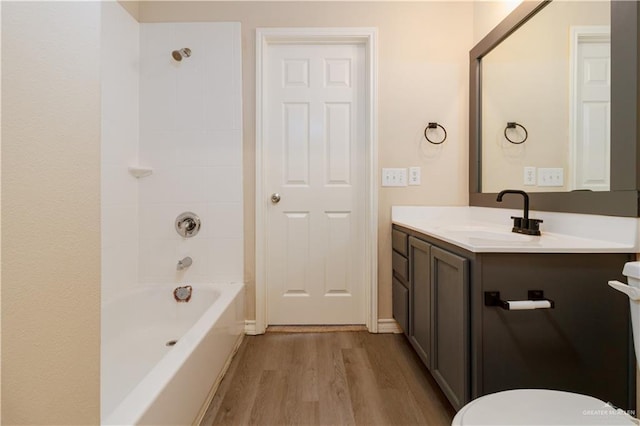 3707 Alvarado St, Edinburg, TX 78539 - bathroom with wood finished floors, vanity, and bathing tub / shower combination