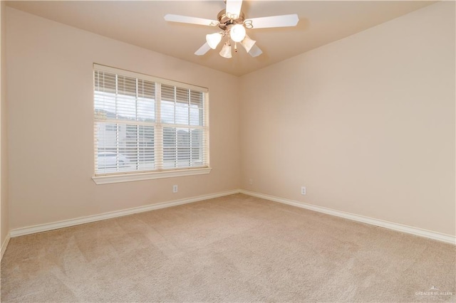 3707 Alvarado St, Edinburg, TX 78539 - carpeted spare room with baseboards and ceiling fan