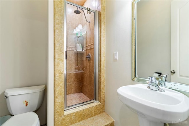 6614 Mile 7 Rd, Mission, TX 78573 - full bathroom featuring a shower stall, a sink, and toilet