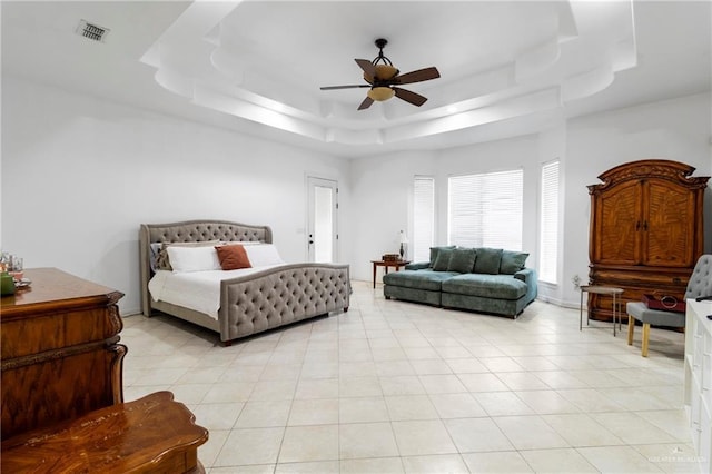 6614 Mile 7 Rd, Mission, TX 78573 - bedroom featuring a tray ceiling, ceiling fan, and light tile patterned floors
