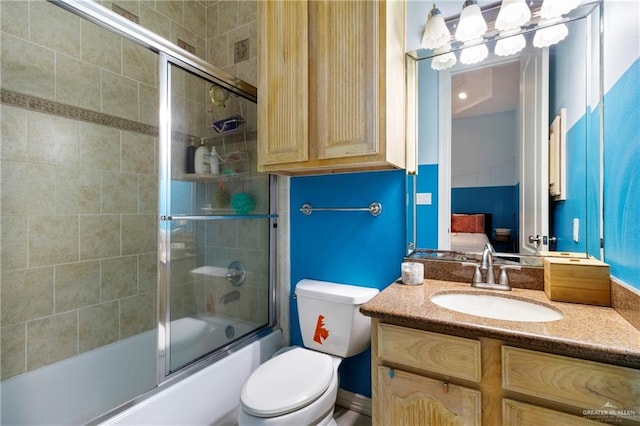 6614 Mile 7 Rd, Mission, TX 78573 - bathroom featuring vanity, combined bath / shower with glass door, toilet, and ensuite bath